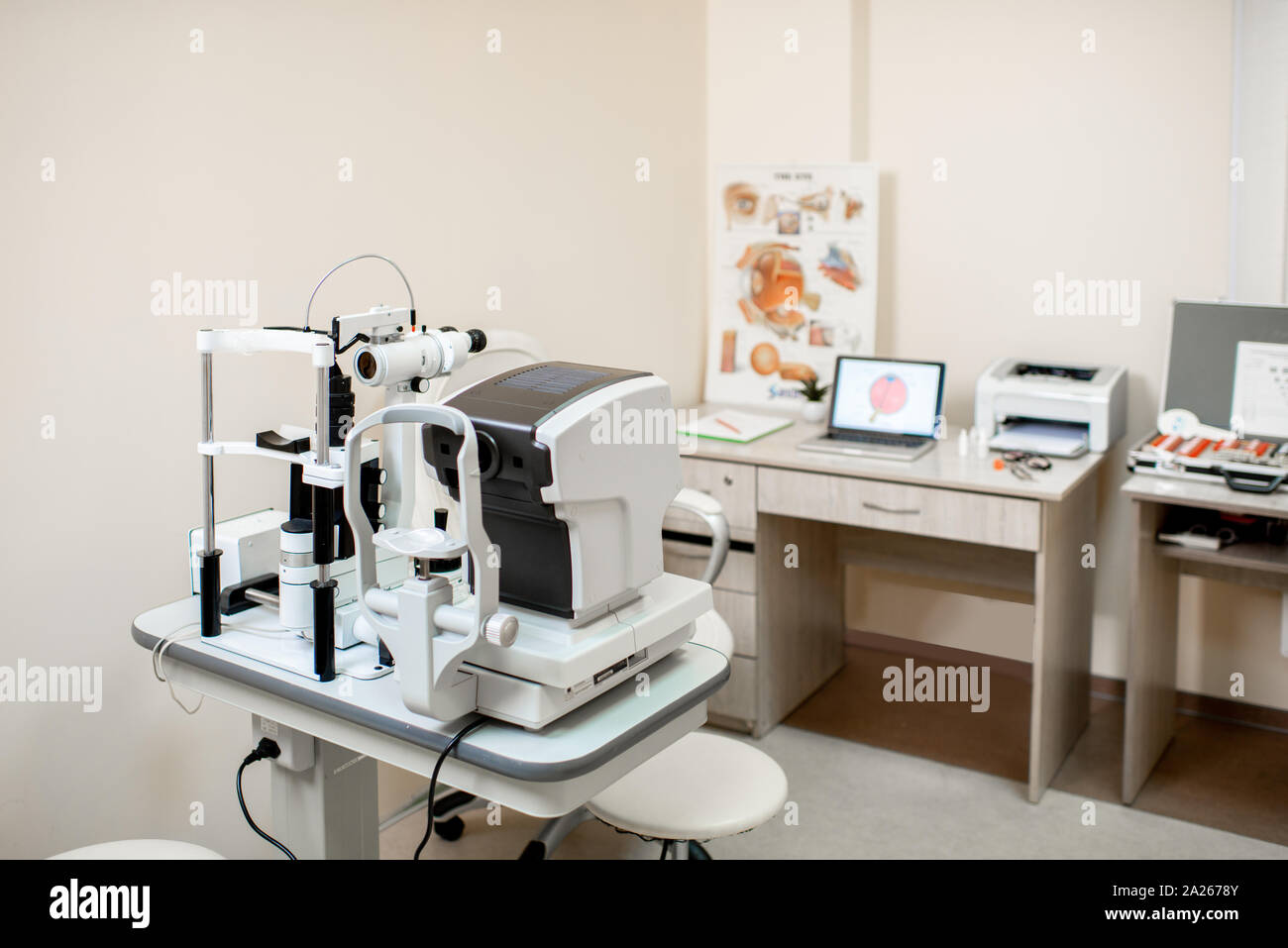 Ophthalmological office with diagnostic equipment and doctors working