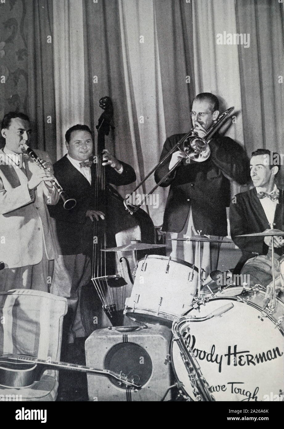 photograph showing four members of the Woody Herman Orchestra.1945. L. to R.: Woody Herman, Chubby Jackson. Bill Harris, Dave Tough Stock Photo