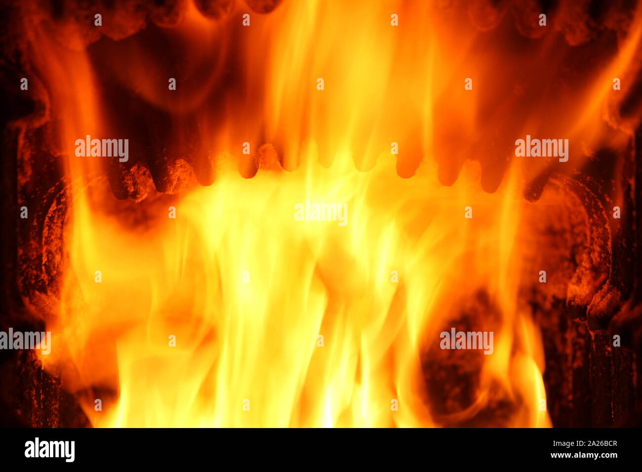 Fireplace with fire at night - outdoor shot Stock Photo