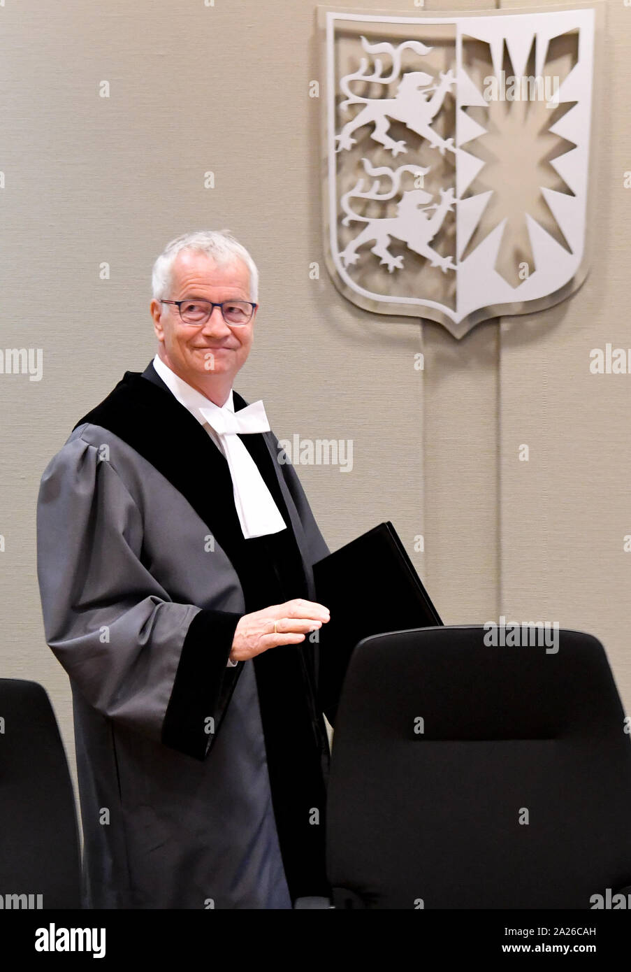 Schleswig, Germany. 01st Oct, 2019. Bernhard Flor, President of the Schleswig-Holstein Constitutional Court, stands in the courtroom. In an oral hearing, the State Constitutional Court deals with the question of whether a general ban on fracking can be anchored in state law. The popular initiative for the protection of the water wants to regulate a Frackingverbot in Schleswig-Holstein over changes in the federal state water law. Credit: Carsten Rehder/dpa/Alamy Live News Stock Photo