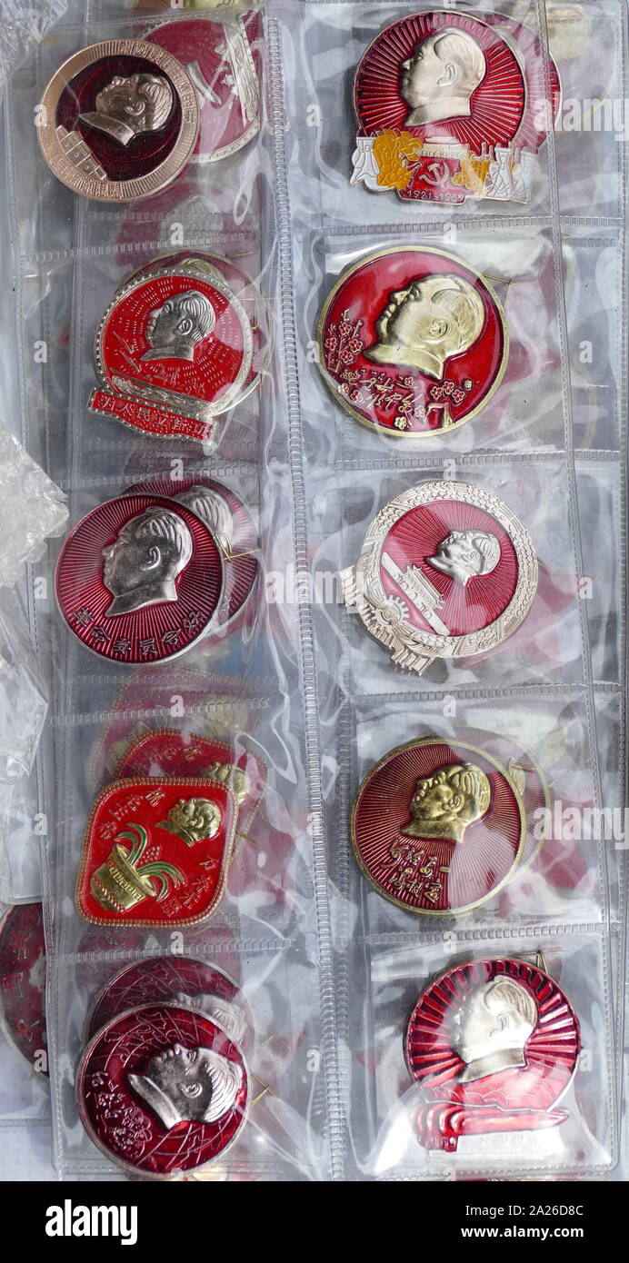 Badges depicting the portrait of Mao Zedong were an important part of the cult of personality surrounding the Chinese communist leader in the 1960's Stock Photo
