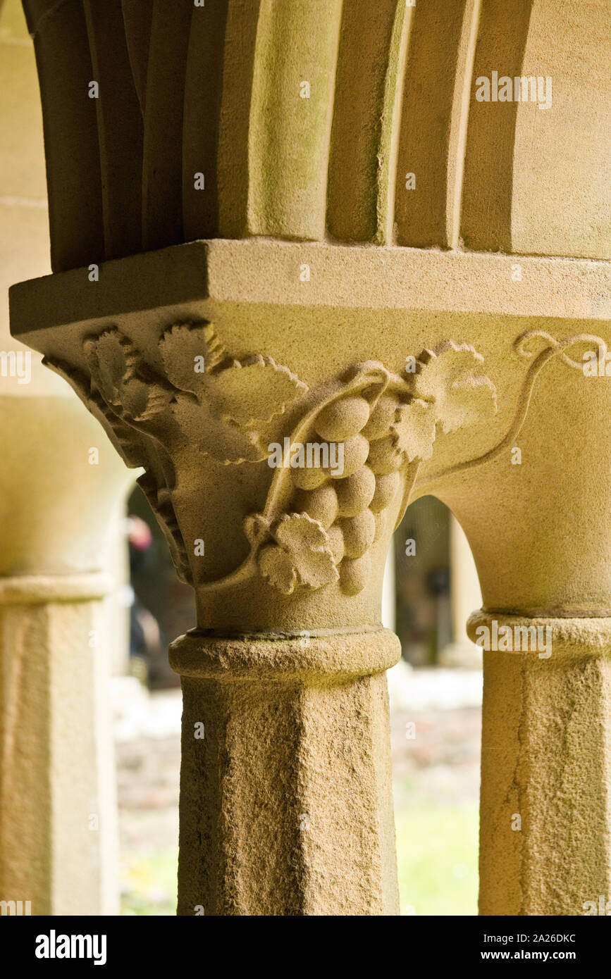 Wine grapes sculpture on pillar of Cloisters of the Iona Abbey. Church
