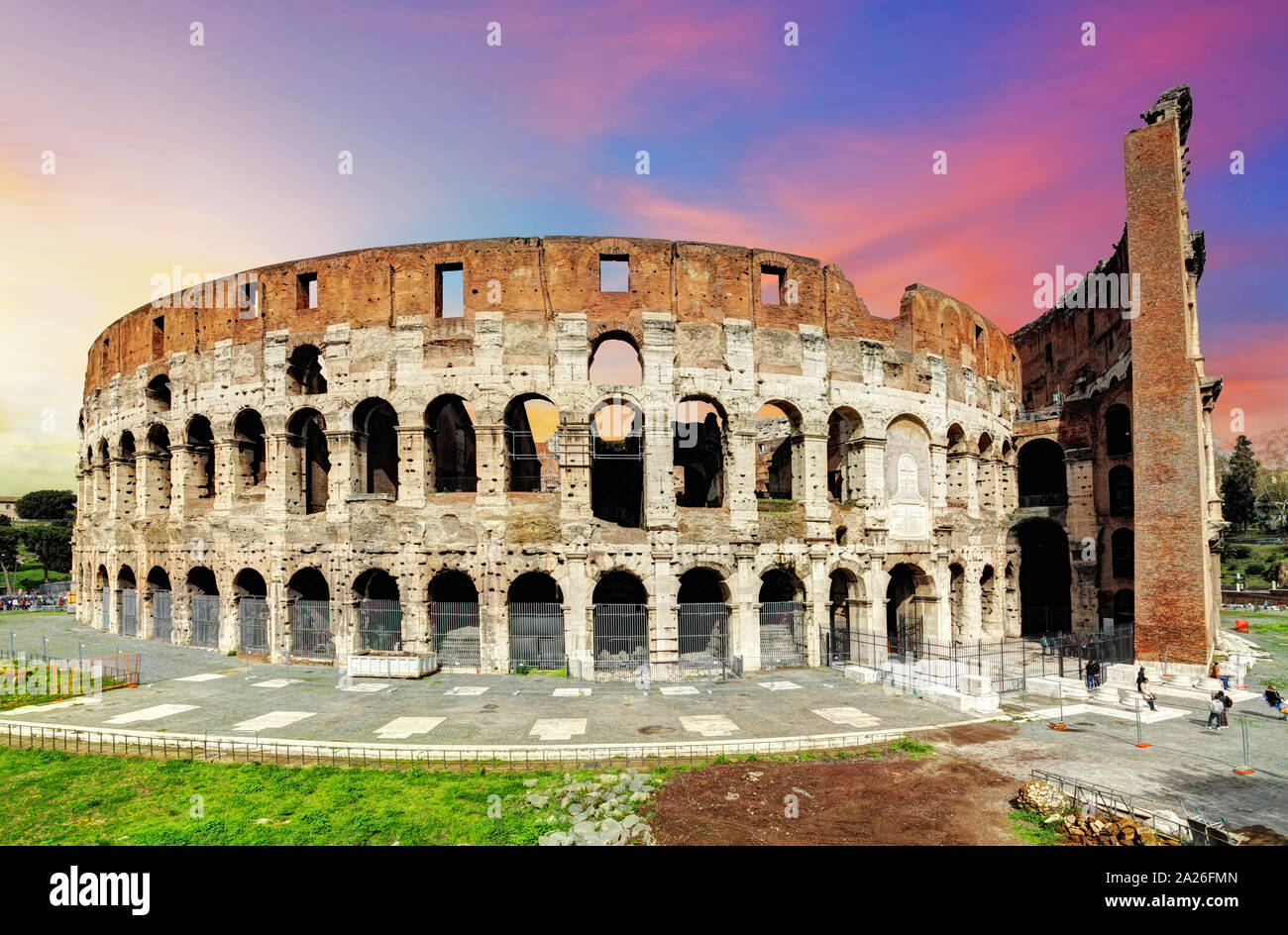 Colosseum in Rome at sunset, Italy Stock Photo