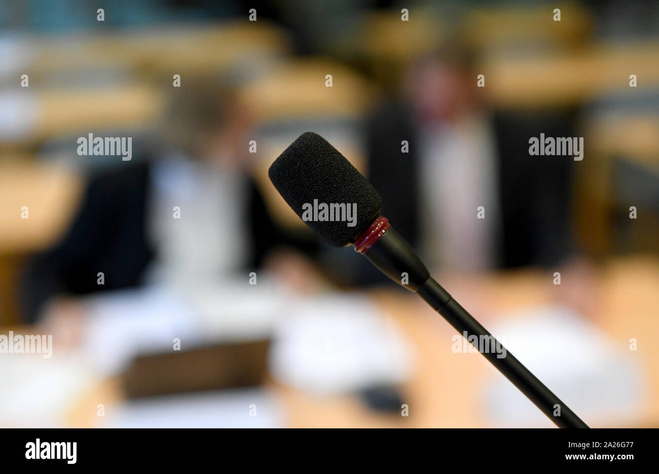 Schleswig, Germany. 01st Oct, 2019. The microphone for speeches is in the courtroom. In an oral hearing, the State Constitutional Court deals with the question of whether a general ban on fracking can be anchored in state law. The popular initiative for the protection of the water wants to regulate a Frackingverbot in Schleswig-Holstein over changes in the federal state water law. Credit: Carsten Rehder/dpa/Alamy Live News Stock Photo