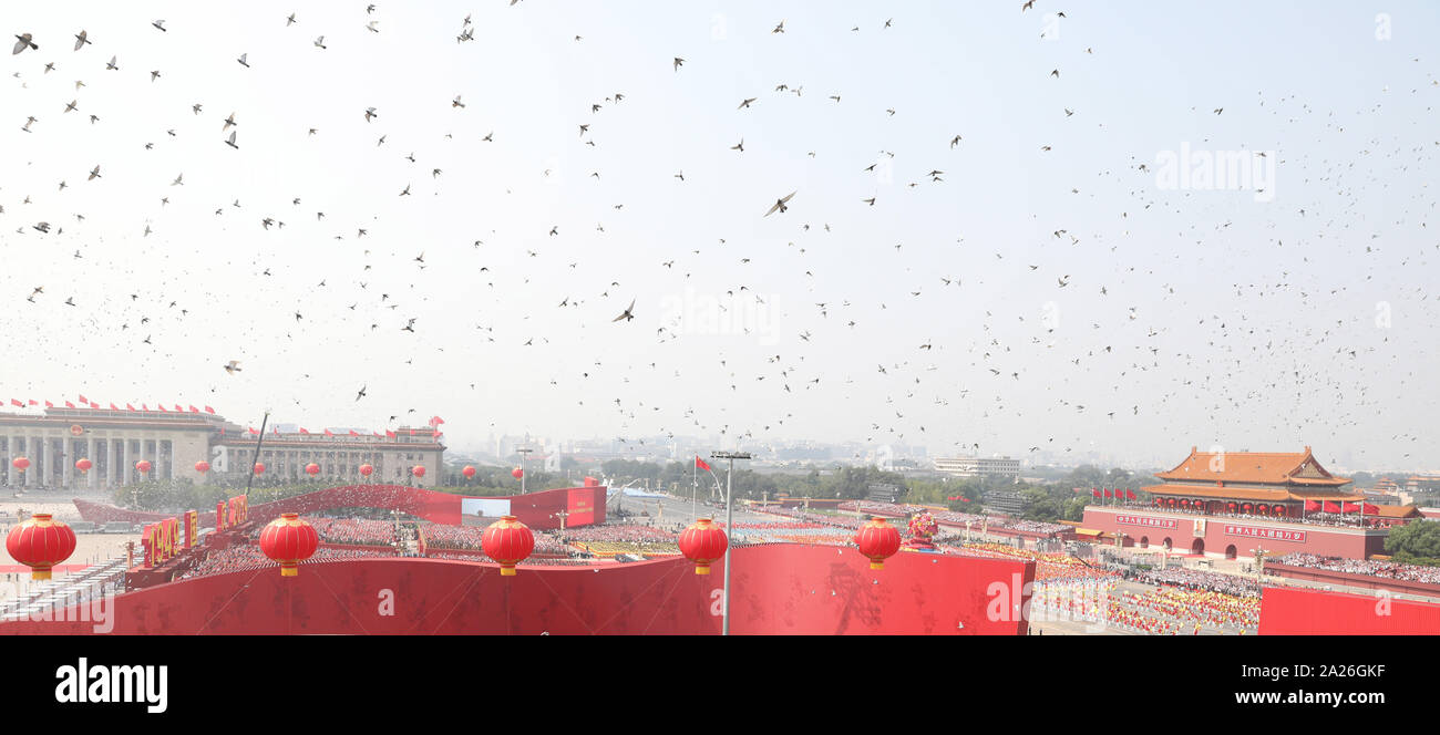 Beijing, China. 1st Oct, 2019. Doves are released to the sky during the celebrations for the 70th founding anniversary of the People's Republic of China (PRC) in Beijing, capital of China, Oct. 1, 2019. Credit: Jin Liwang/Xinhua/Alamy Live News Stock Photo