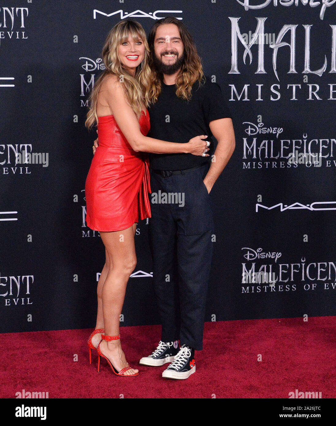 Los Angeles, United States. 01st Oct, 2019. Model, television personality and actress Heidi Klum and her husband, German guitarist Tom Kaulitz attend the premiere of the motion picture fantasy 'Maleficent: Mistress of Evil' at the El Capitan Theatre in the Hollywood section of Los Angeles on Monday, September 30, 2019. Storyline: Maleficent and her goddaughter Aurora begin to question the complex family ties that bind them as they are pulled in different directions by impending nuptials, unexpected allies, and dark new forces at play. Photo by Jim Ruymen/UPI Credit: UPI/Alamy Live News Stock Photo