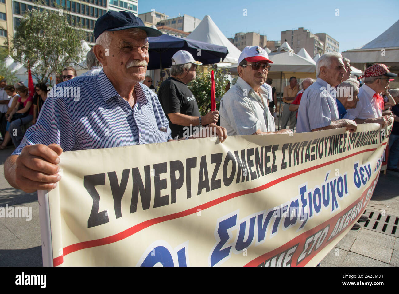 Athens, Greece. 1st Oct, 2019. Protesters attend speeches by pensioners' unionists as they prepare to march to the Ministry of Labor. Pensioners' unions took to the streets to protest over pension cuts and fiscal policies and demand return of their slashed pensions. Credit: Nikolas Georgiou/Alamy Live News Stock Photo