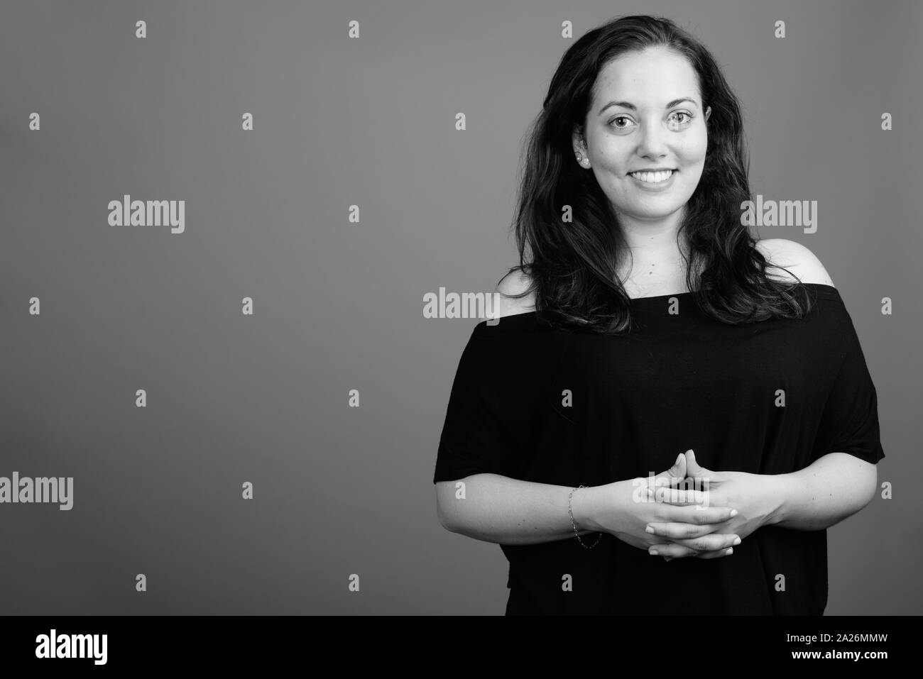 Portrait of young happy woman smiling shot in black and white Stock ...