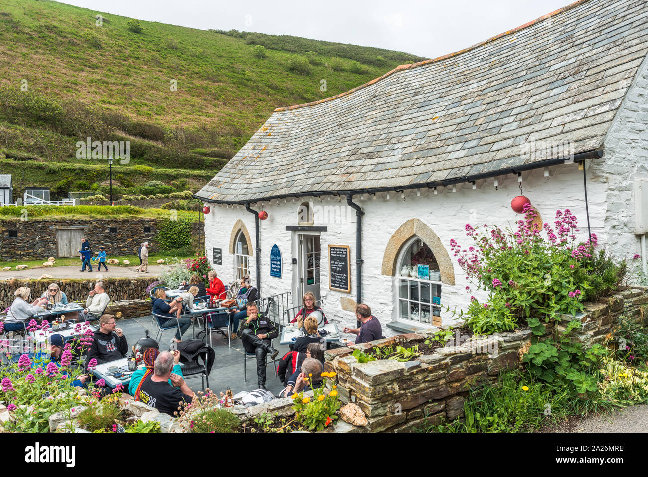 The Harbour Light house, a 16th century building, now a shop and cafe and YHA next door, Boscastle harbour, Cornwall, England, UK Stock Photo