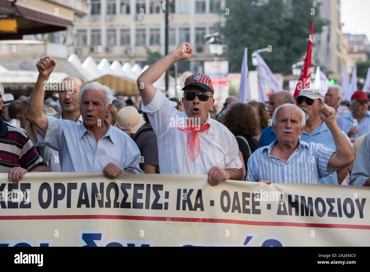 Athens, Greece. 1st Oct, 2019. Protesters march to the Ministry of Labor, shoutings slogans. Pensioners' unions took to the streets to protest over pension cuts and fiscal policies and demand return of their slashed pensions. Credit: Nikolas Georgiou/Alamy Live News Stock Photo