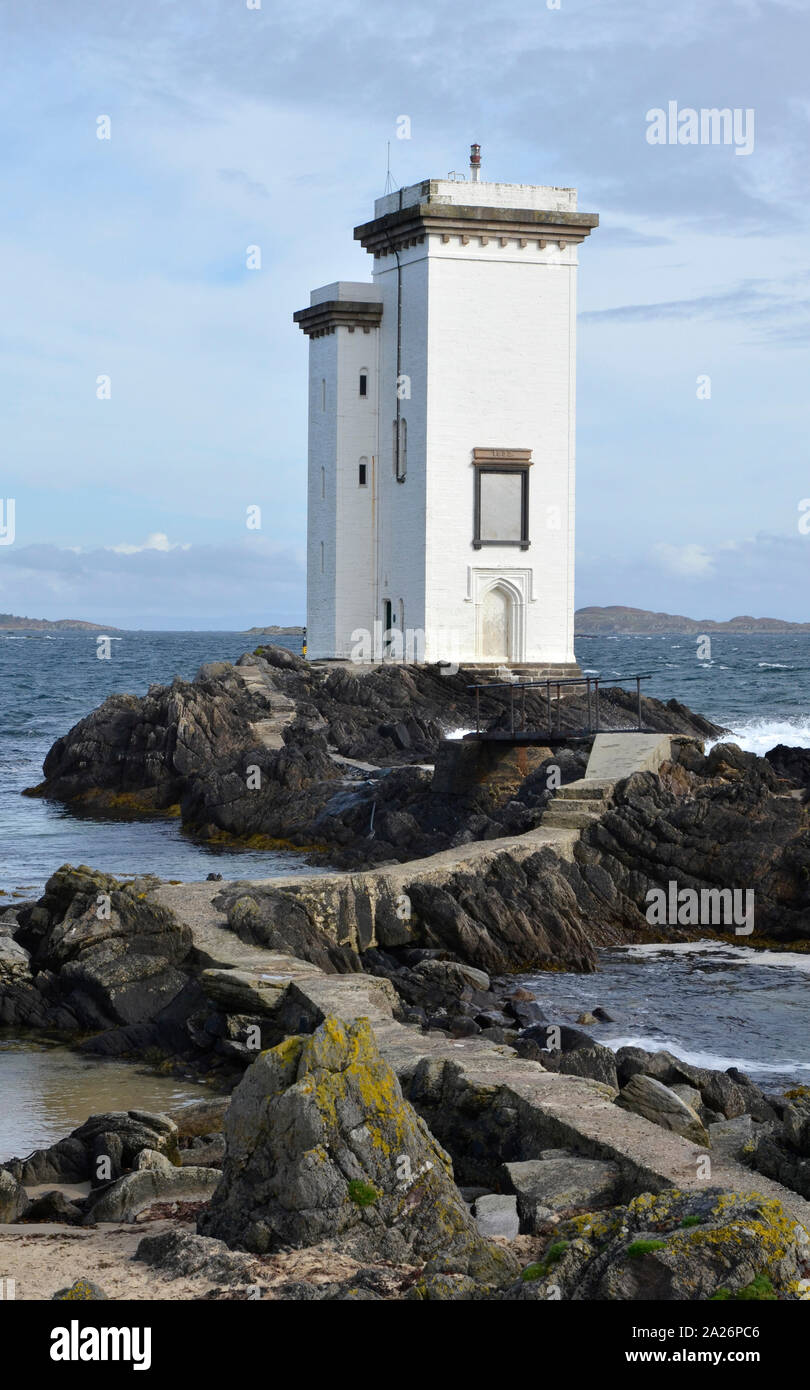 The lighthouse at Port Ellen on the coast at Carraig Fhada on the ...