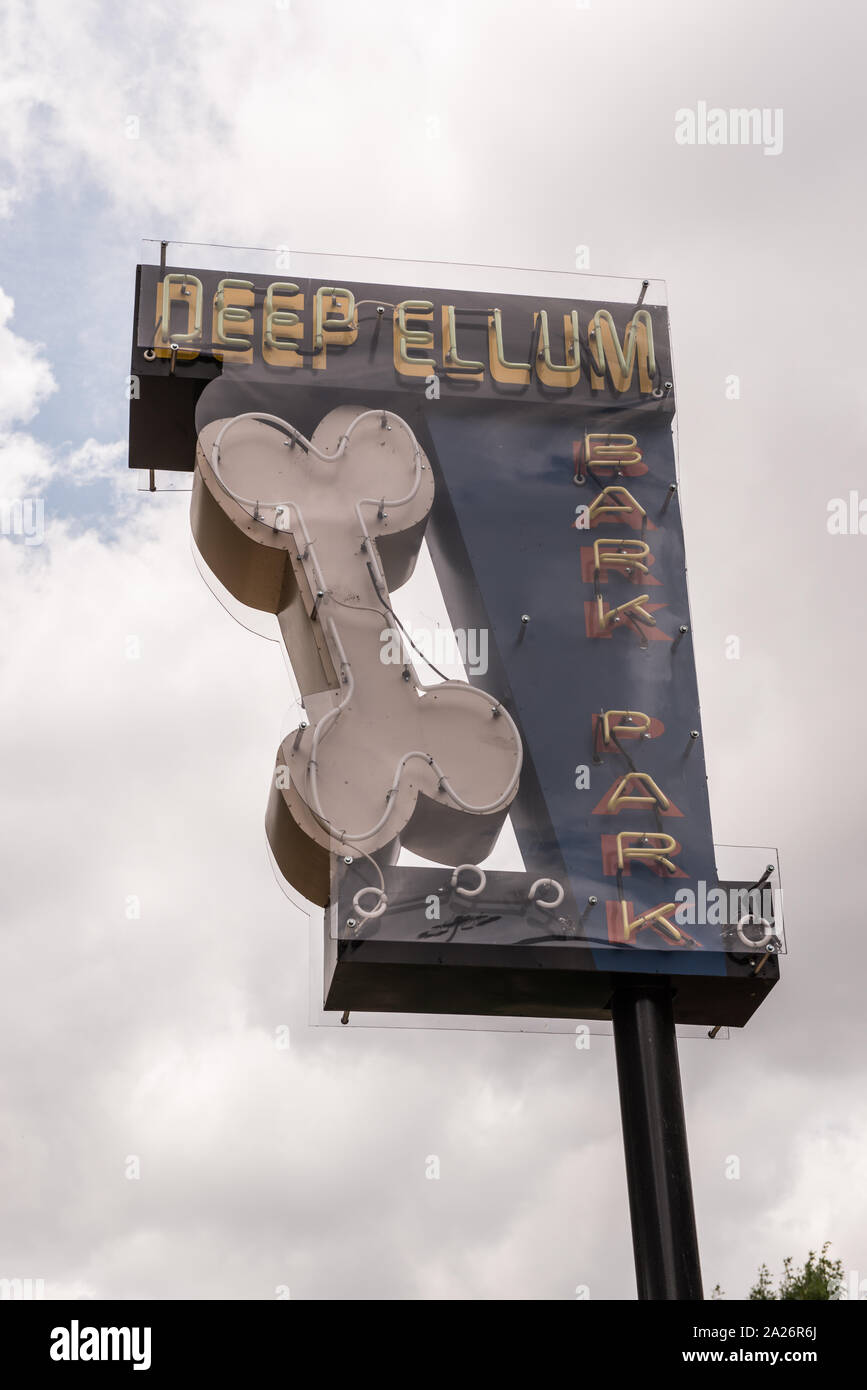 Pooch-themed art in the form of this identifying neon sign at the Deep Ellum bark park, an off-leash dog park in Deep Ellum, a neighborhood composed largely of arts and entertainment venues near downtown in Old East Dallas, Texas Stock Photo
