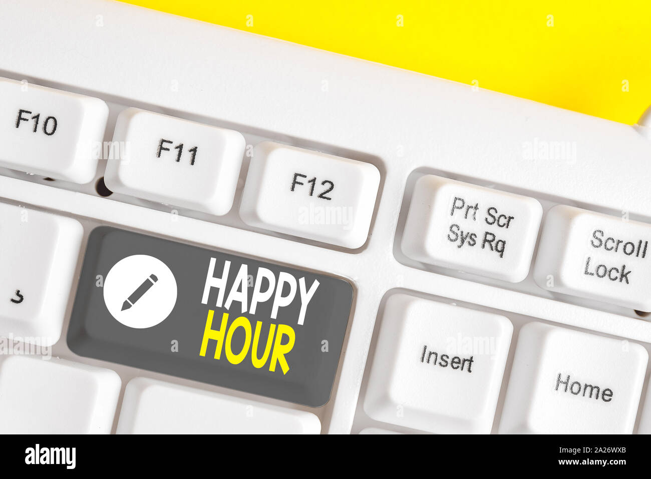Writing note showing Happy Hour. Business concept for Spending time for activities that makes you relax for a while White pc keyboard with note paper Stock Photo