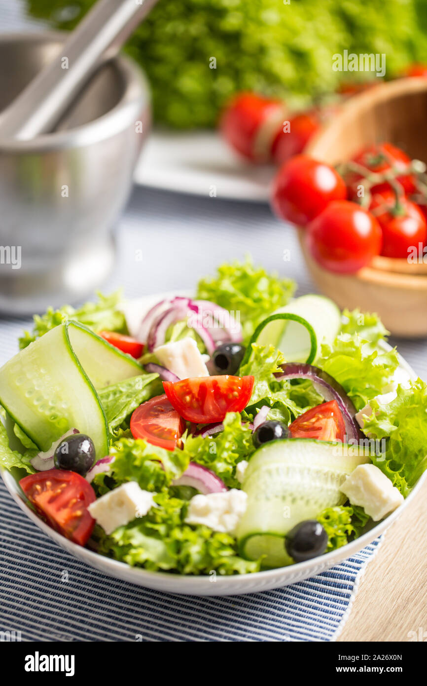 Feta cheese salad with red olives tomato red onion High Resolution
