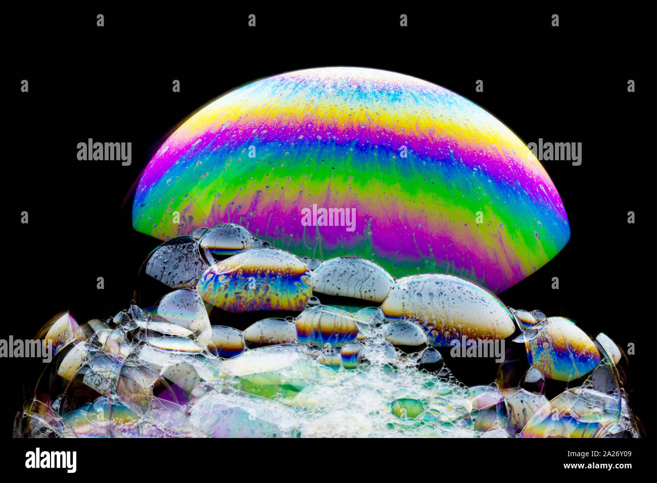 Cosmic waterfall - beautiful  soap-bubble abstract on black background Stock Photo