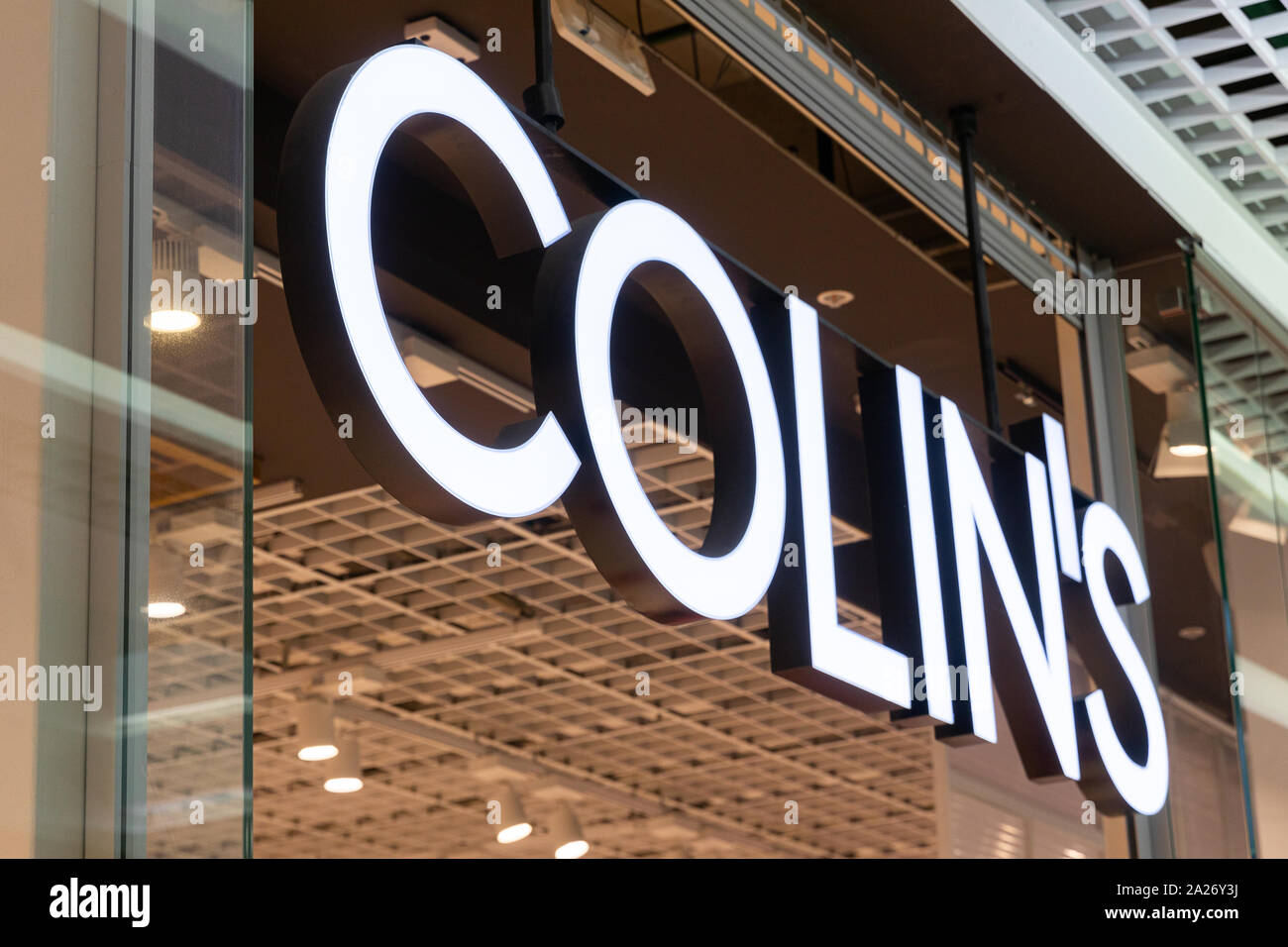 Minsk, Belarus - July 16, 2019: Colin's logo at the store facade. Collin's is mass market clothing brand. Stock Photo
