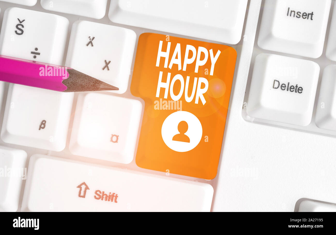 Conceptual hand writing showing Happy Hour. Concept meaning Spending time for activities that makes you relax for a while White pc keyboard with note Stock Photo
