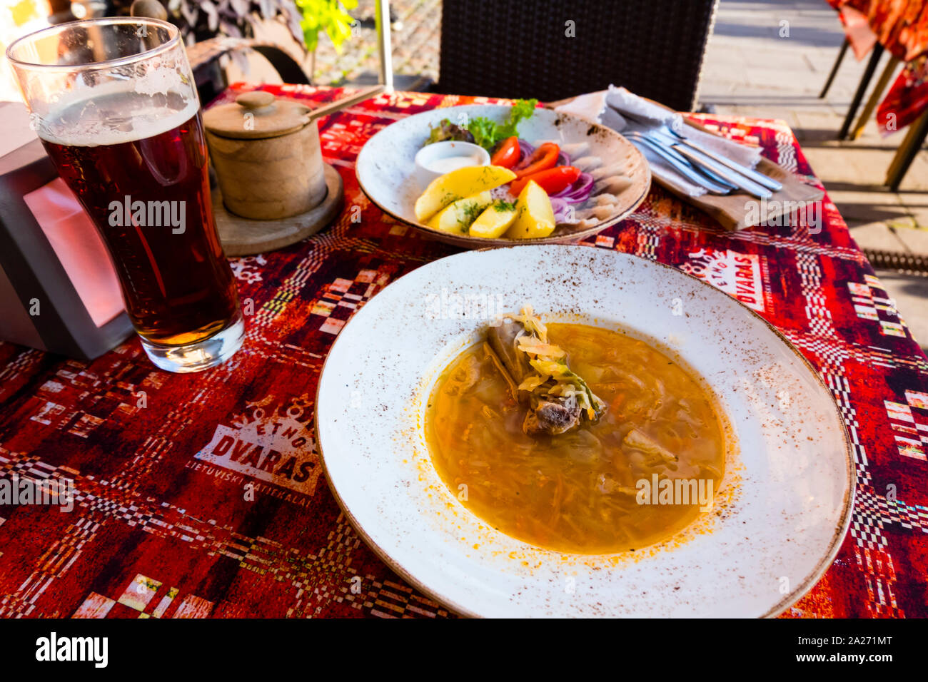 Traditional Lithuanian dishes and beer, old town, Kaunas, Lithuania Stock Photo