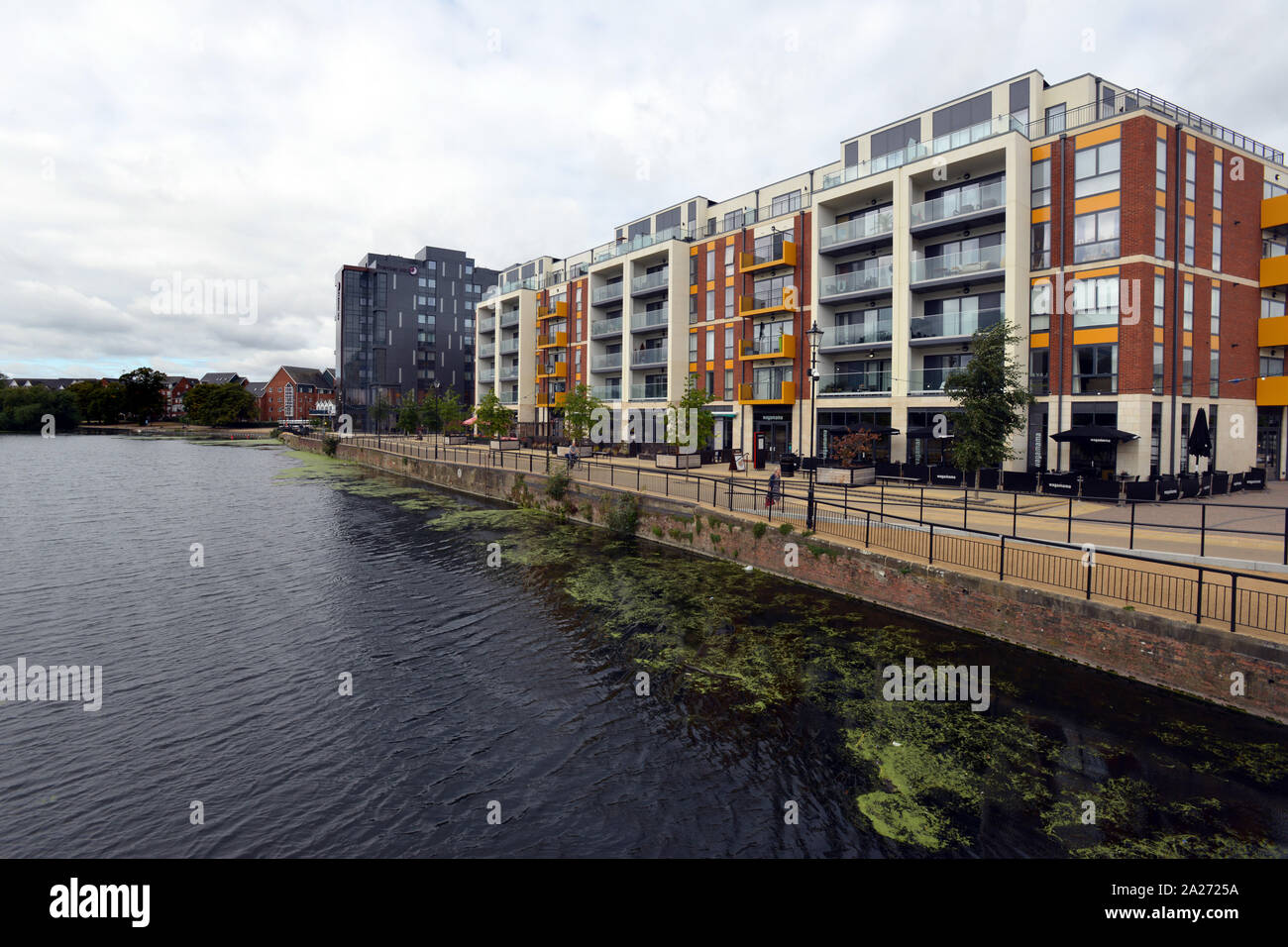 Flats and restaurants on the riverside of the Great Ouse in Bedford, Bedfordshire a new development in the town centre. Stock Photo