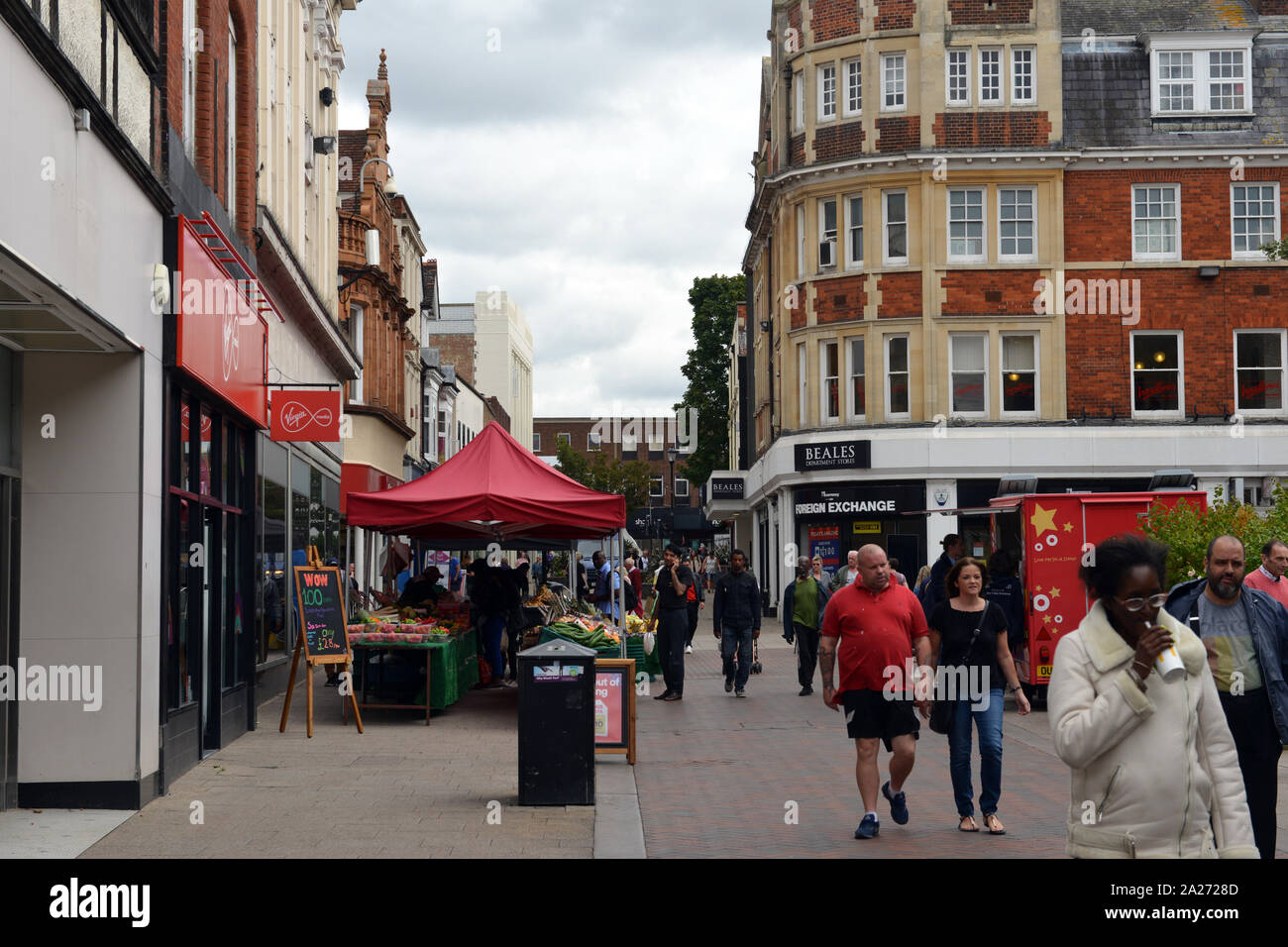 Pedestrianised section of Midland Road, Bedford, with shoppers in the town centre. Stock Photo