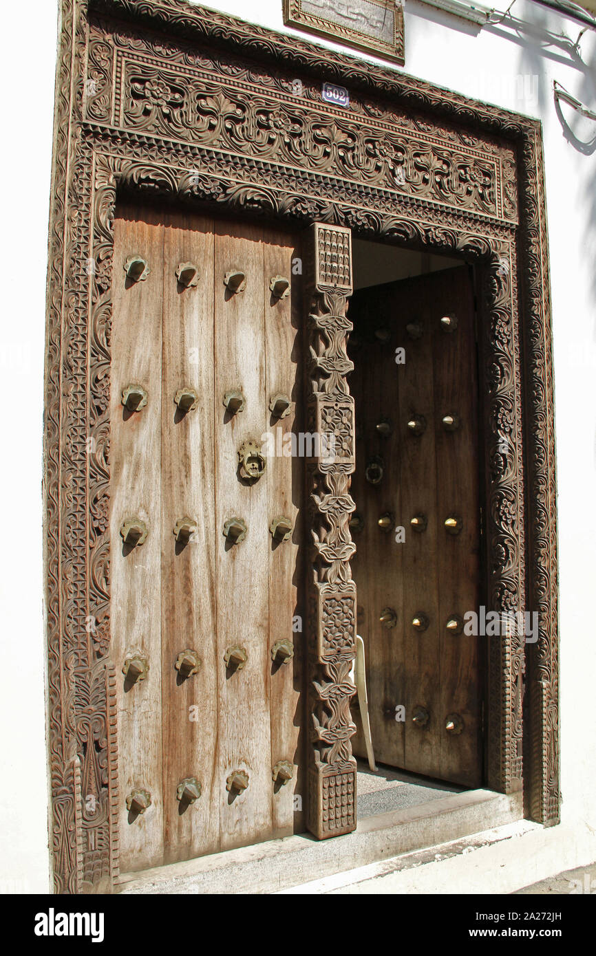 Carved wooden doors of stone town Stock Photo - Alamy