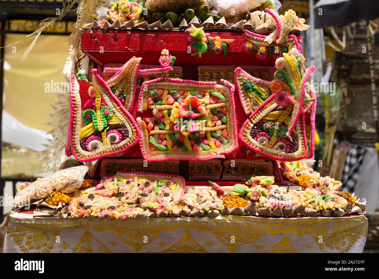 Traditional offerings to gods in Indonesia with flowers, fruits and