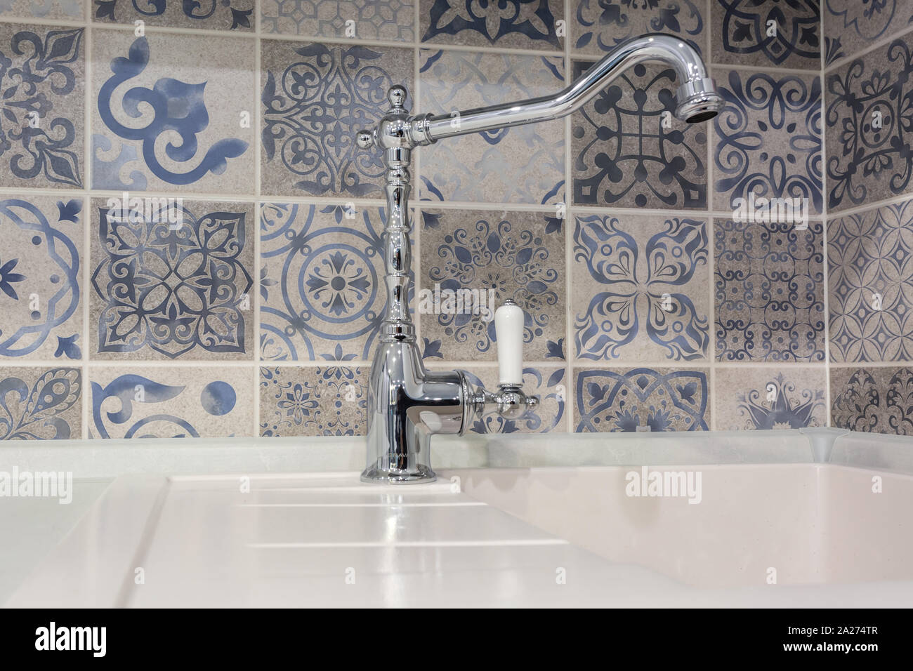 Steel Water Tap Sink With Faucet In Expensive Loft Kitchen Stock