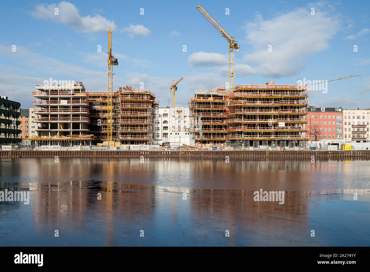25.02.2018, Berlin, Berlin, Germany - New construction of residential buildings in the former East Harbour in Muehlenstrasse in Berlin-Friedrichshain. Stock Photo