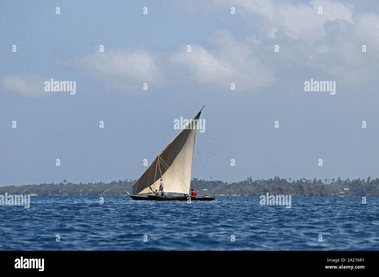 Sail fishing boat off the the coast of Zanzibar, Unguja Island, Tanzania. Stock Photo