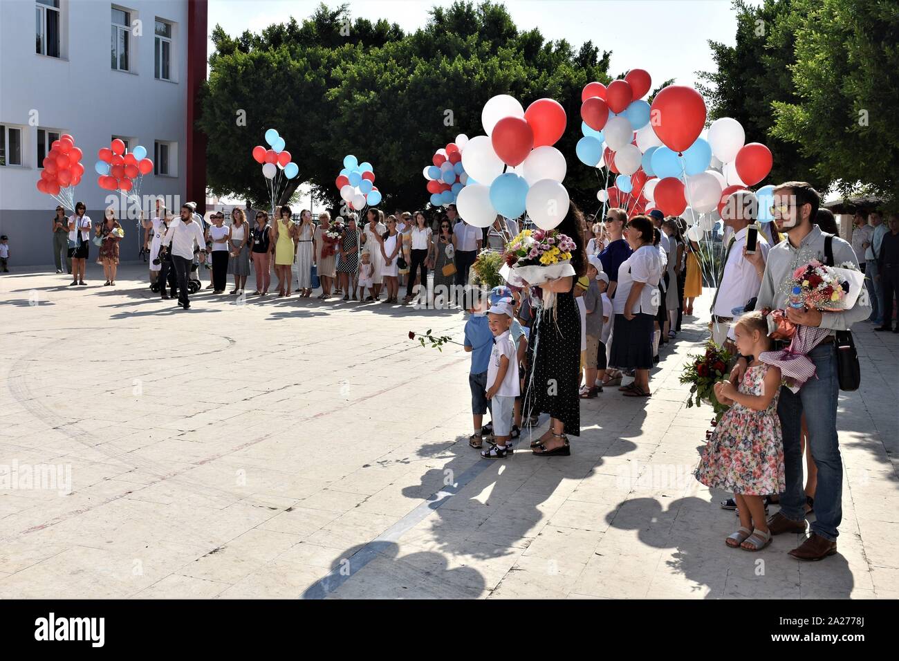 Mersin, Turkey. 1st Oct, 2019. Parents and children stand during the opening ceremony of the Private Moscow International School for the children of the Russian personnel working at the Akkuyu Nuclear Power Plant. Credit: Altan Gocher/ZUMA Wire/Alamy Live News Stock Photo