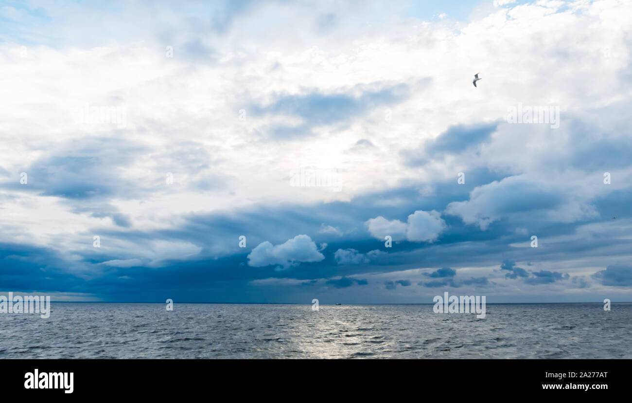 River and cloudy sky Stock Photo - Alamy