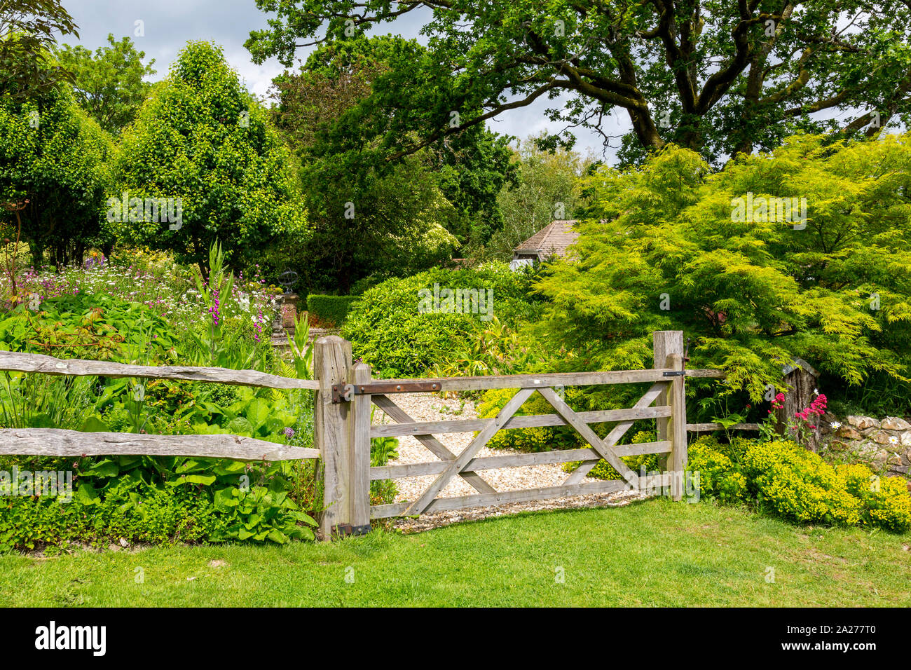 The well stocked and colourful borders of the Terrace Garden at Burrow