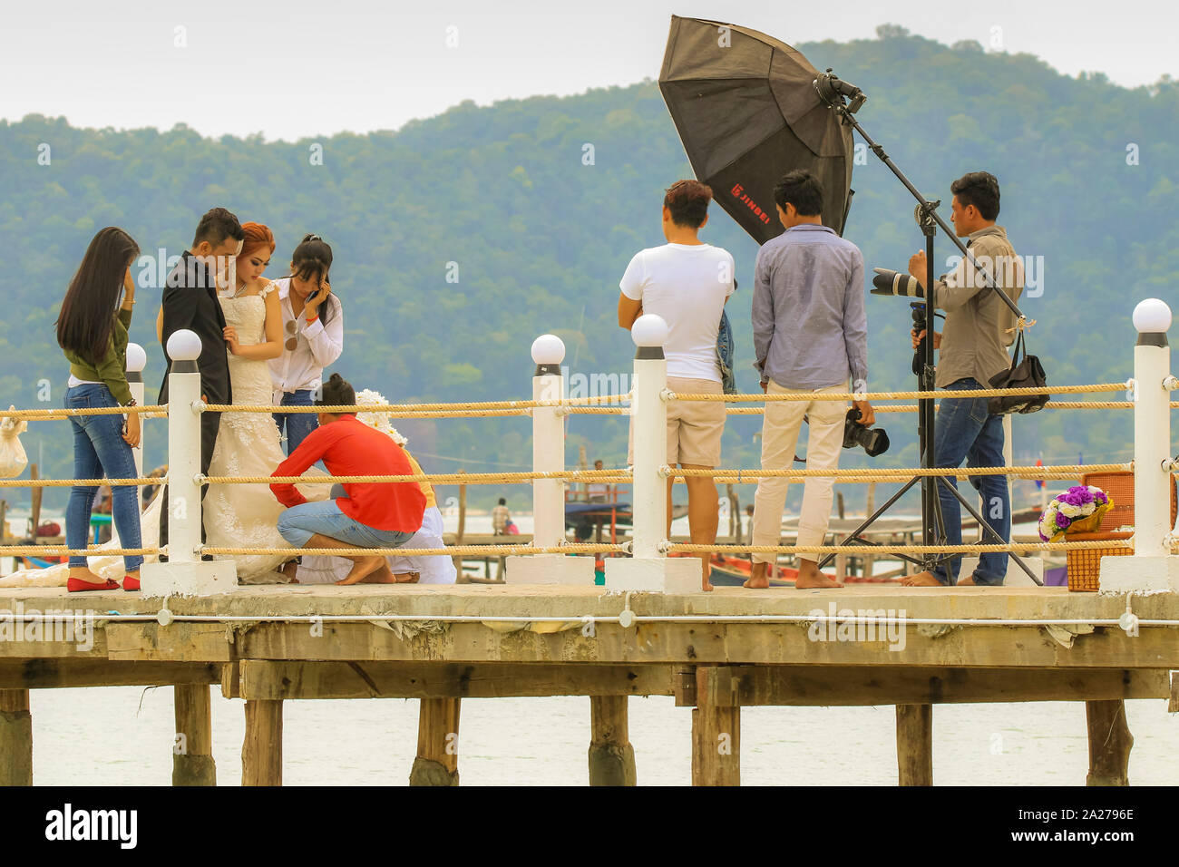 Wedding photography on the pier at this famed white sand beach; Saracen Bay Resort, Koh Rong Sanloem Island, Sihanoukville, Cambodia Stock Photo