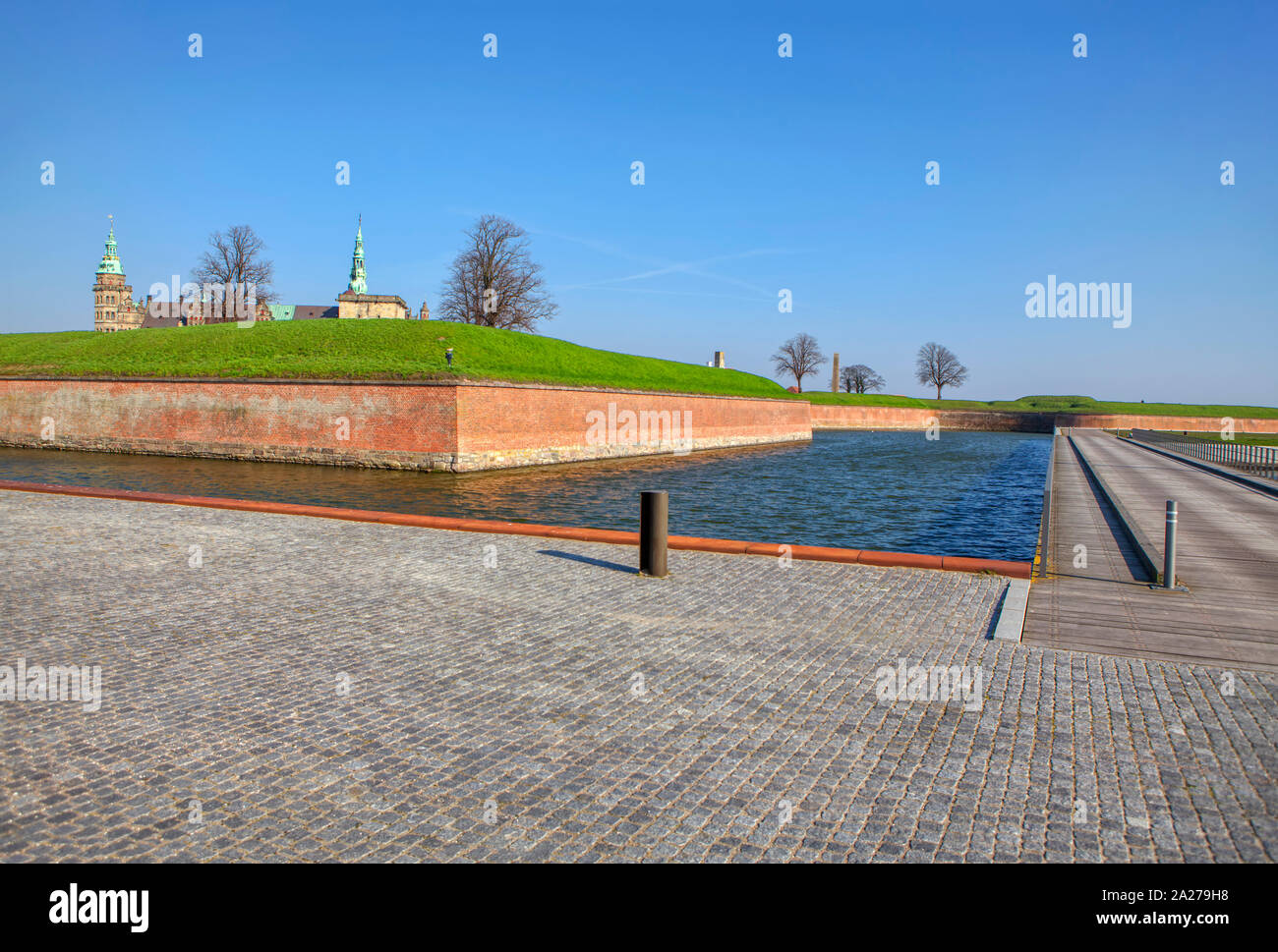 water canal and Kronborg castle in Denmark Stock Photo