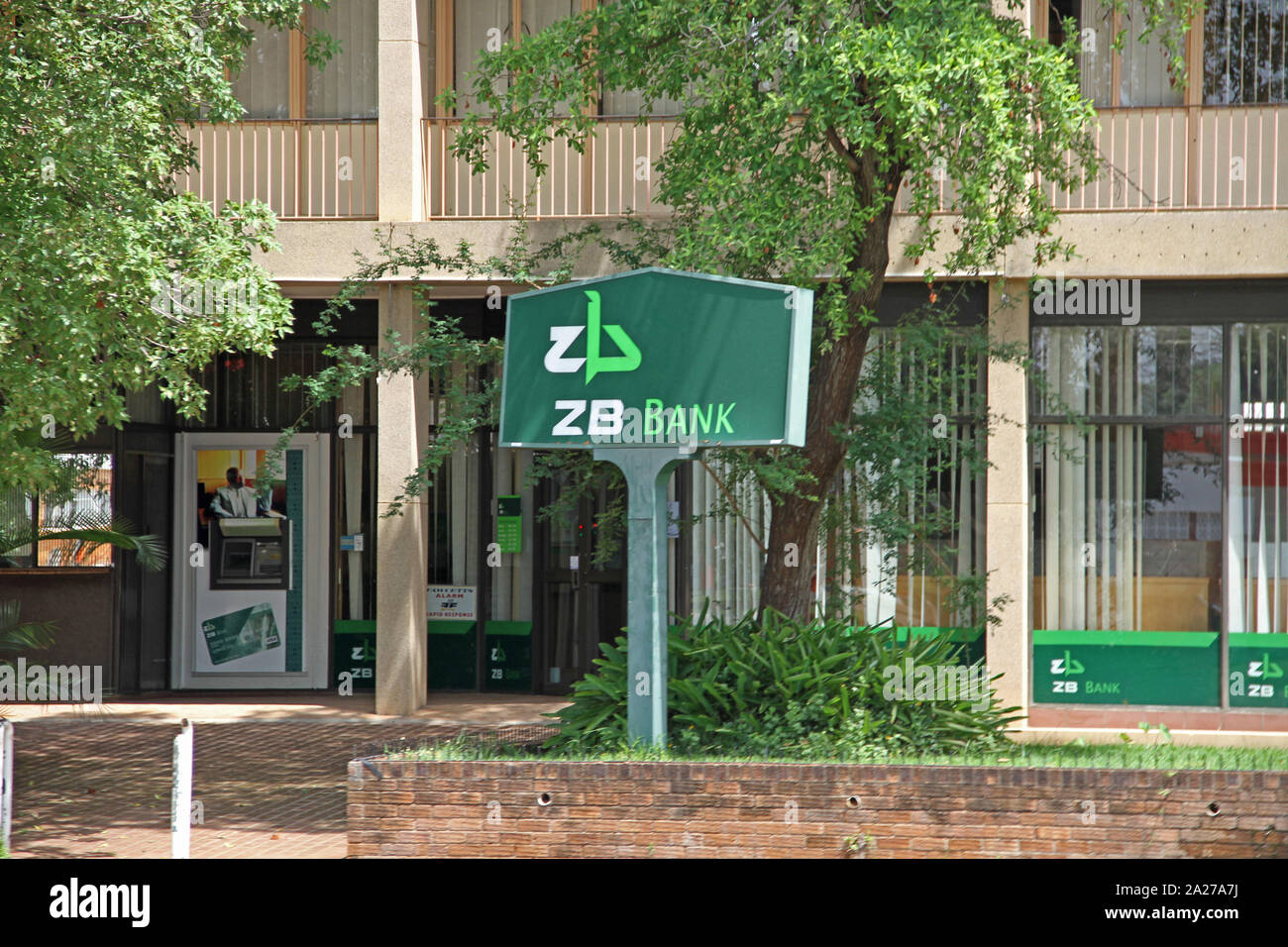 Outisde front entrance to ZB Zimbank branch, Zimbabwe. Stock Photo