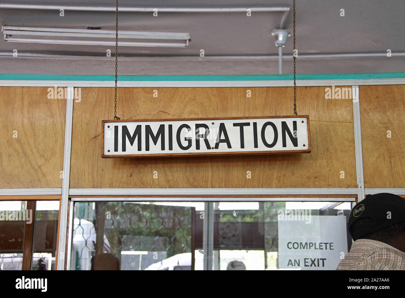 Immigration sign at the immigration post exit, Zimbabwe. Stock Photo