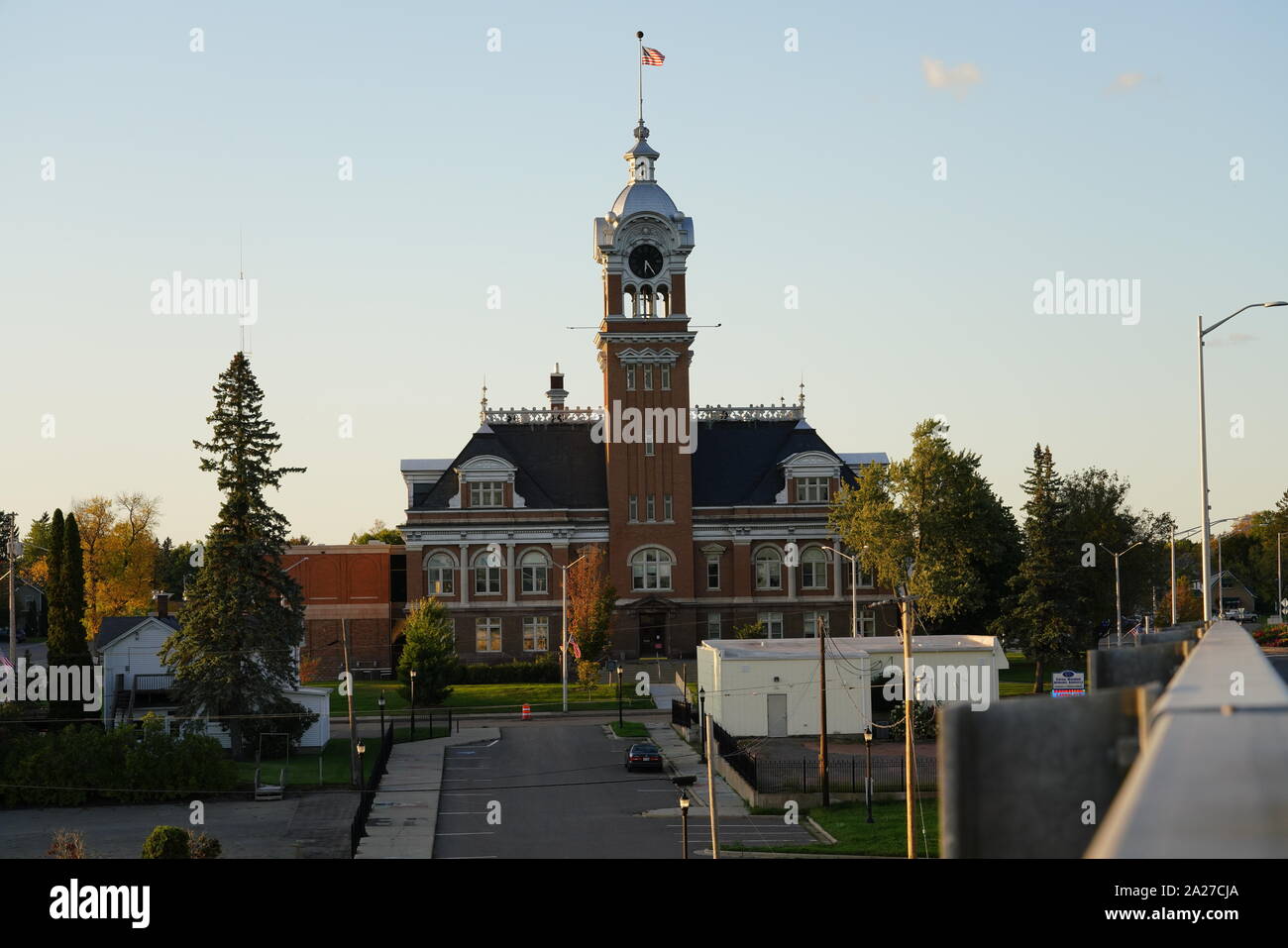 Lincoln County Courthouse clock tower. Built-in 1903 towers over Merrill Wisconsin city. Stock Photo