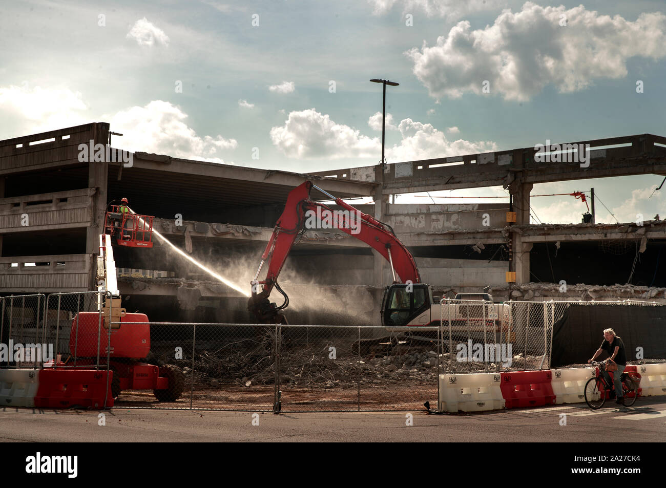 Workers Tear Down The Parking Garage On 4th Street Monday