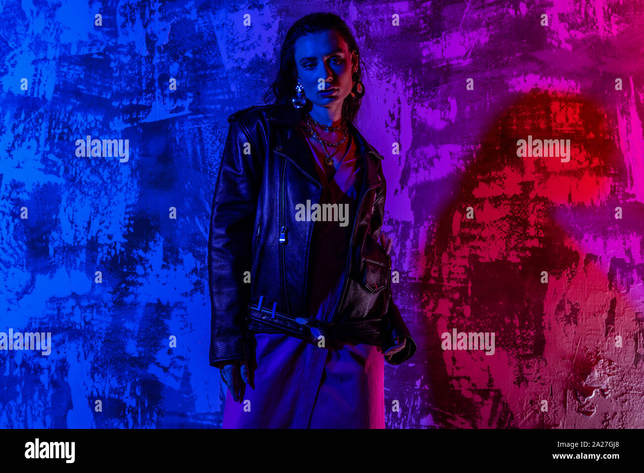 Girl in leather jacket standing hi-res stock photography and images - Alamy