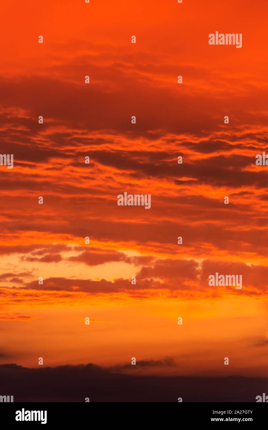 Red coloured clouds in the evening sky, Bavaria, Germany Stock Photo