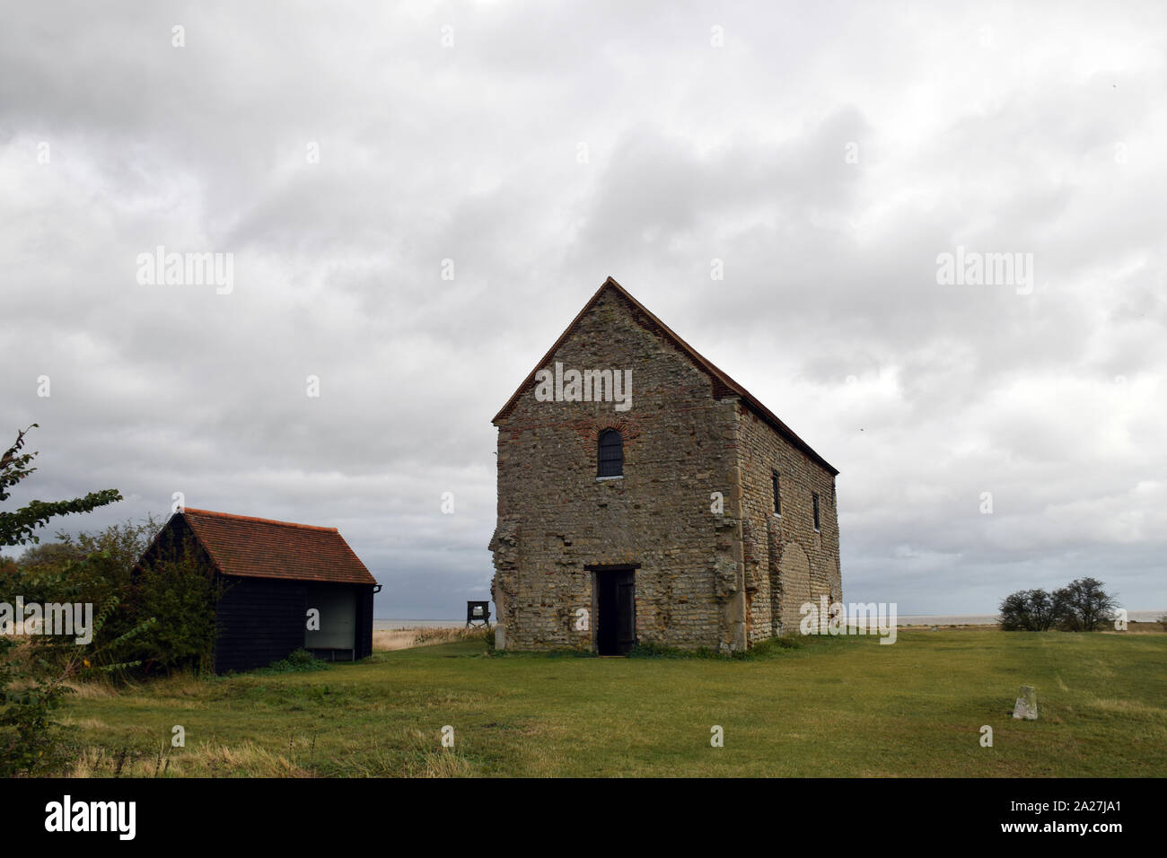 Chapel of St Peter-on-the-Wall, Bradwell-on-Sea, Essex, is one of the oldest largely intact Christian churches in England. Built on the site of a Roma Stock Photo
