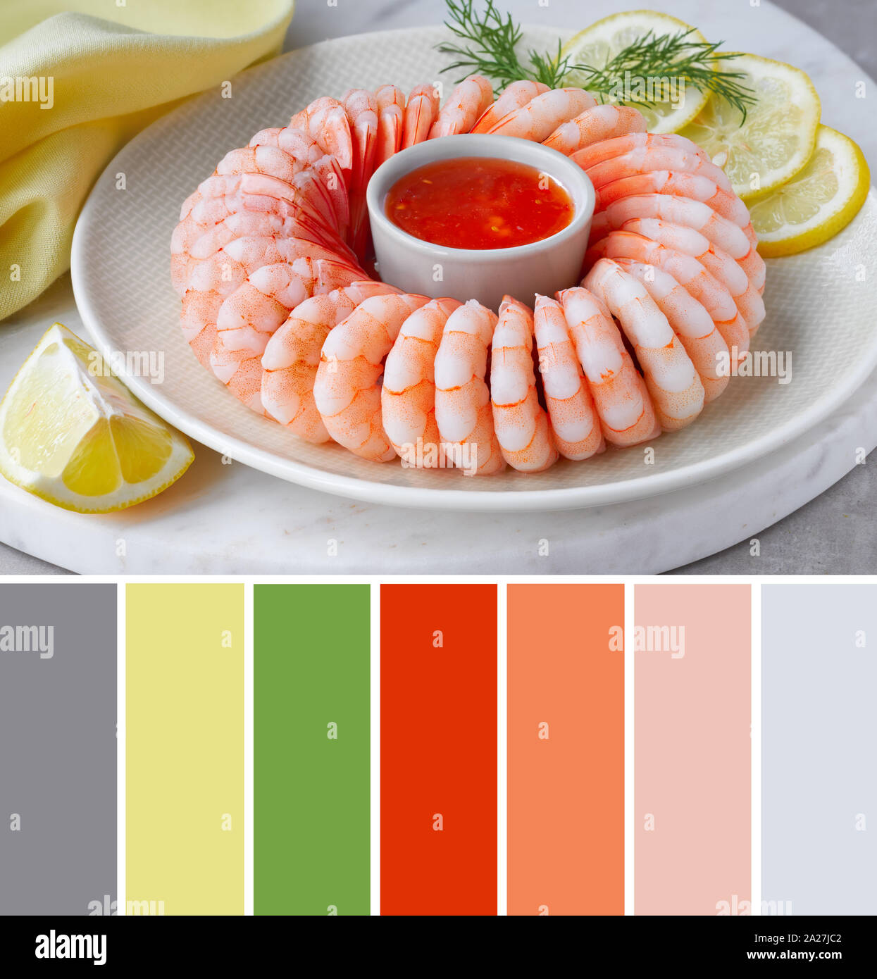 Color matching palette from image of shrimp ring with sweet chili sauce on marble serving board with yellow towel Stock Photo