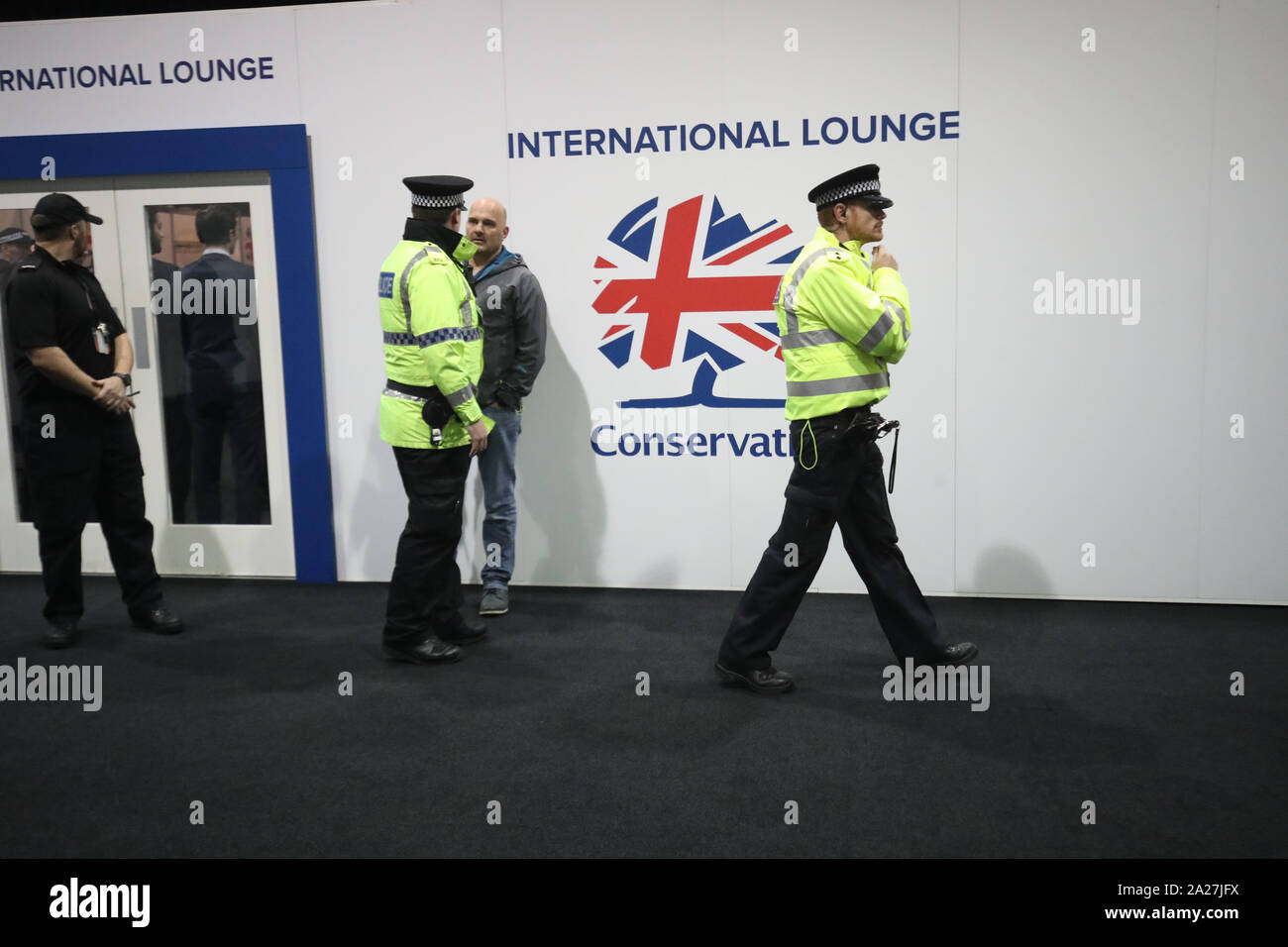 Police arrive at the Conservative Party Conference after a 'small misunderstanding' when an attendee, believed to be Sir Geoffrey Clifton-Brown, MP for The Cotswolds, tried to enter the International Lounge at the Manchester Convention Centre without the relevant pass, triggering a lockdown. Stock Photo
