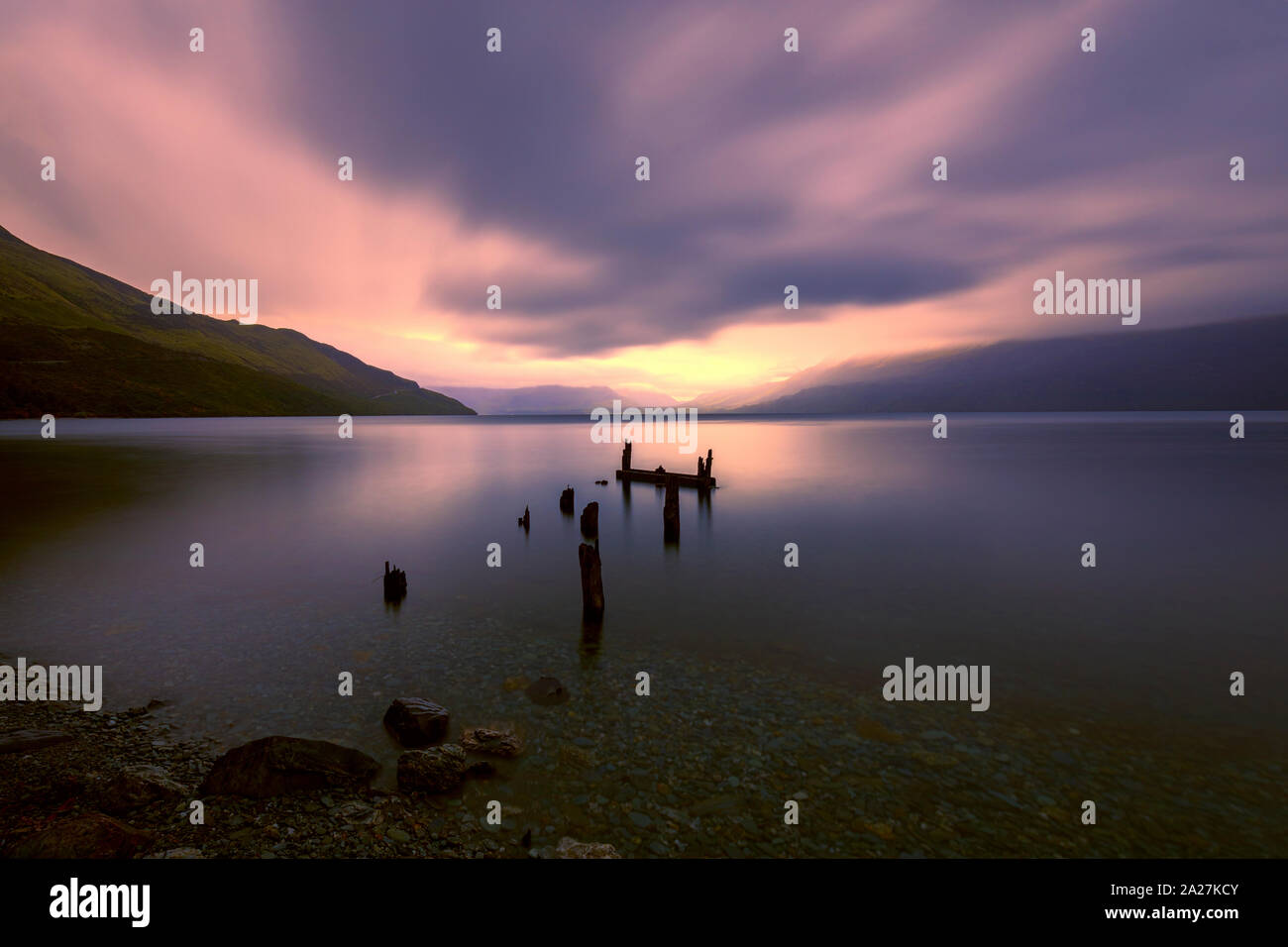 Broken jetty alongside Lake Wakatipu, Glenorchy, New Zealand Stock Photo