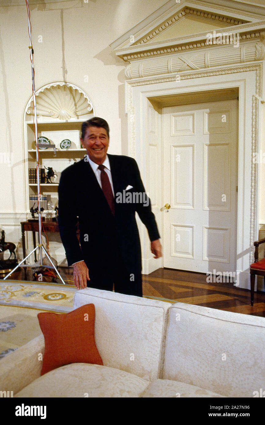 President Ronald Reagan jokes around in the Oval Office of the White House during a photo shoot with each Republican Senator, Washington, D.C Stock Photo