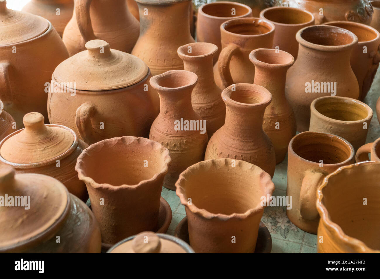 Brown clay pots made in ground oven with firewoods using old