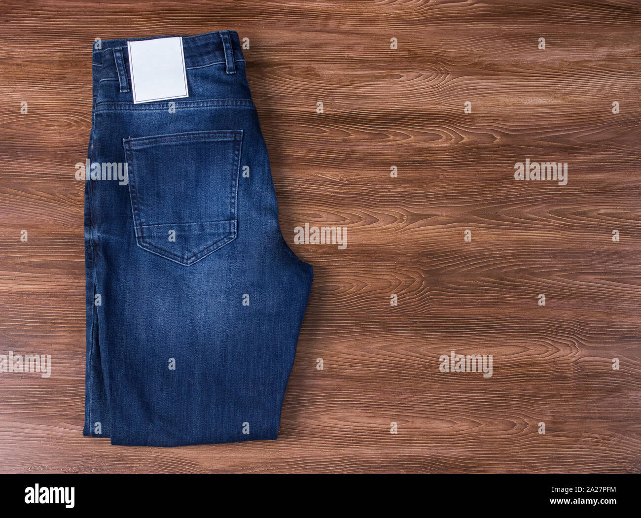 Download Jeans Label Mockup Denim Texture Isolated Wooden Background Stock Photo Alamy