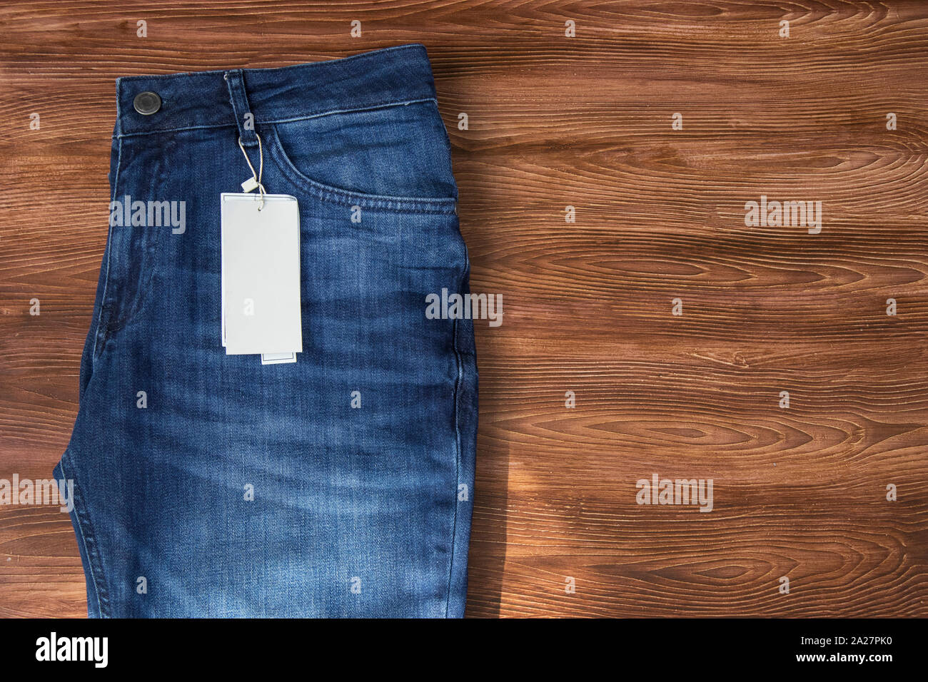Download Jeans Label Mockup Denim Texture Isolated Wooden Background Stock Photo Alamy