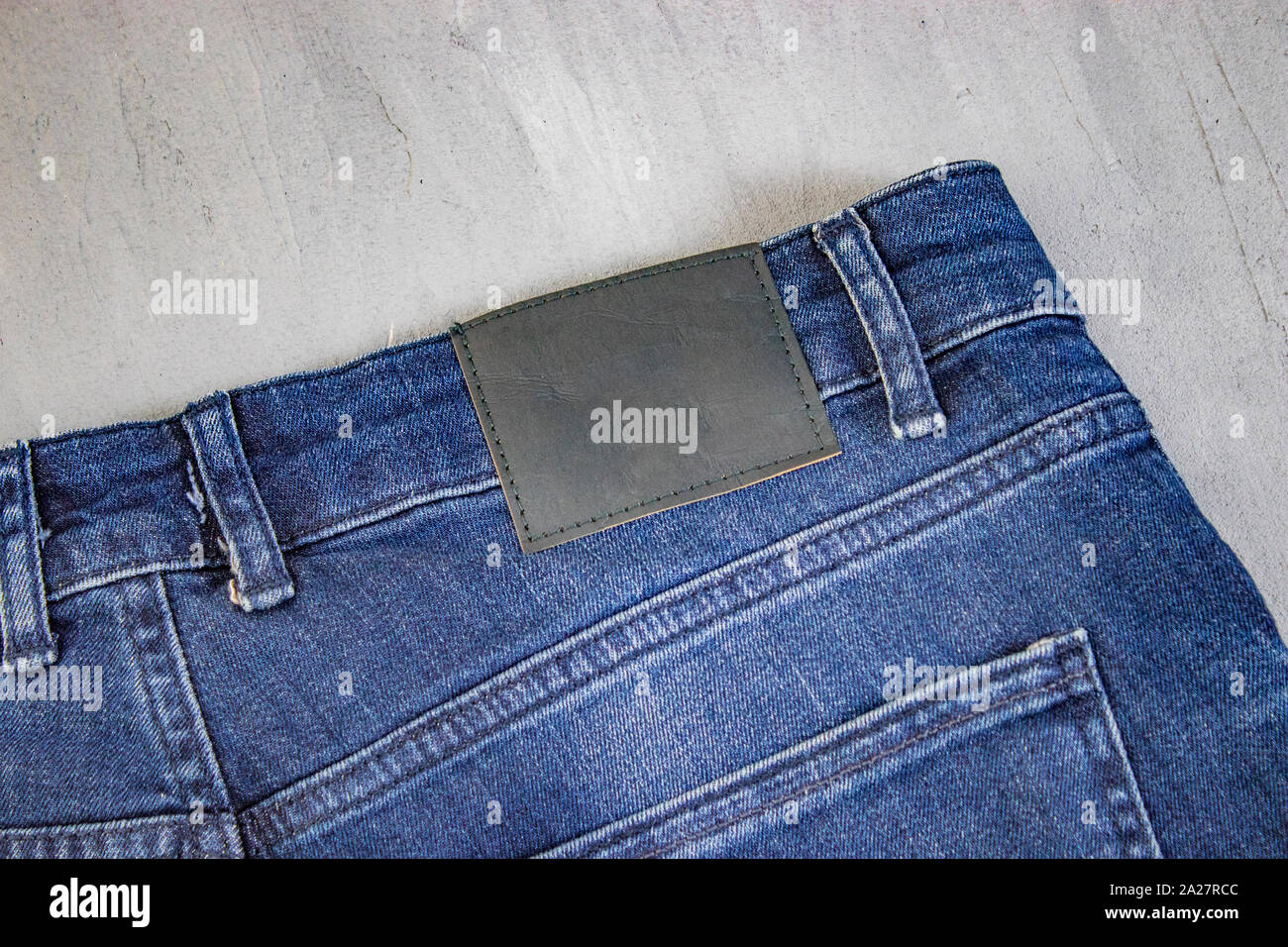 Jeans label mockup, denim texture background, fashion design Stock Photo -  Alamy