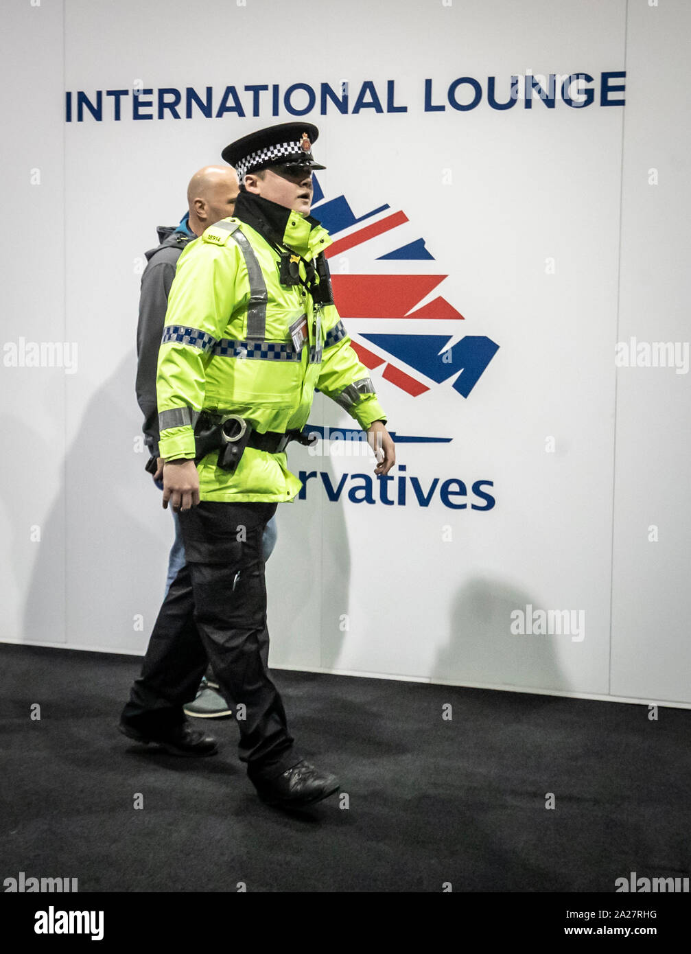 Police arrive at the Conservative Party Conference after a 'small misunderstanding' when an attendee, Sir Geoffrey Clifton-Brown, MP for The Cotswolds, tried to enter the International Lounge at the Manchester Convention Centre without the relevant pass, triggering a lockdown. Stock Photo